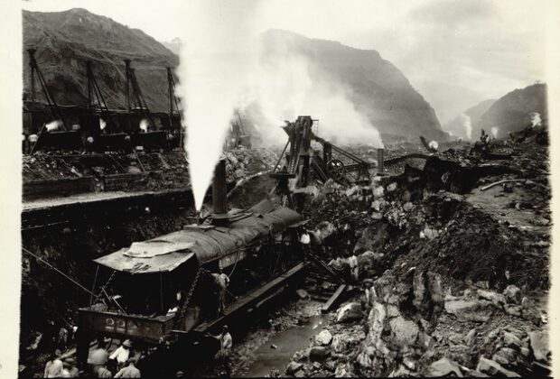 Steam shovels meet at grade in Culebra Cut on May 20, 1913—a construction-era view of the canal excavation.
