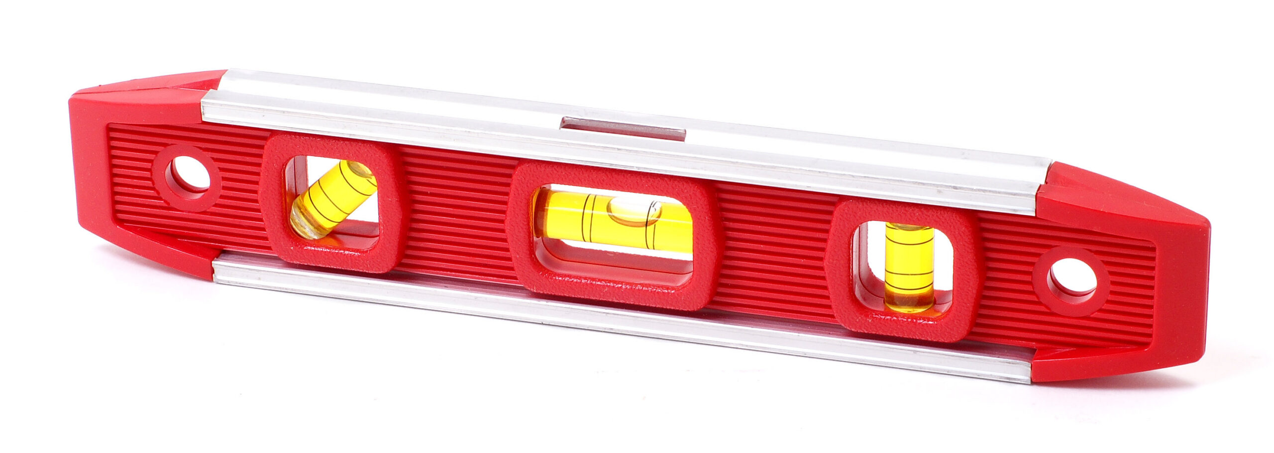 Traditional yellow spirit level with three bubble vials