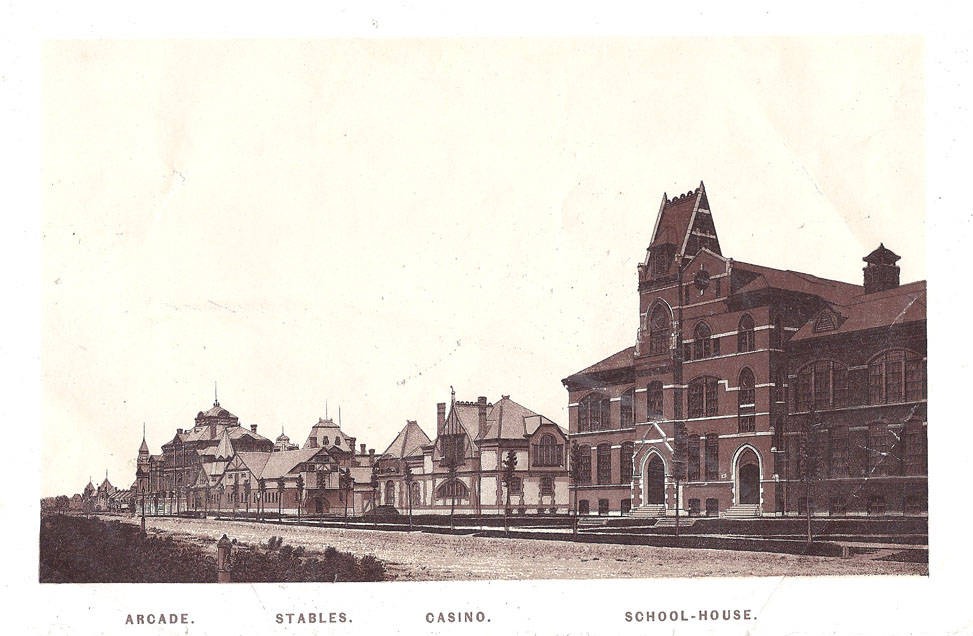 Historic Pullman street view with buildings labeled Arcade, Stables, Casino, and School-house.