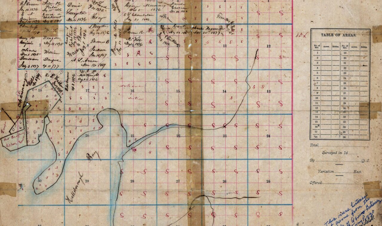 Historic map of the Ybor City area of Tampa, Florida, identifying landowners, surveyed sections, water features, and settlements.