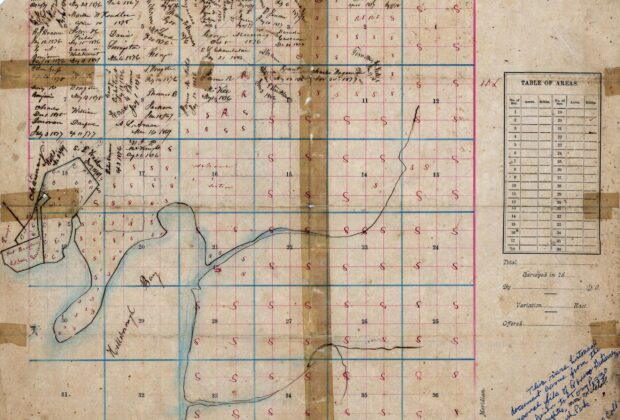 Historic map of the Ybor City area of Tampa, Florida, identifying landowners, surveyed sections, water features, and settlements.